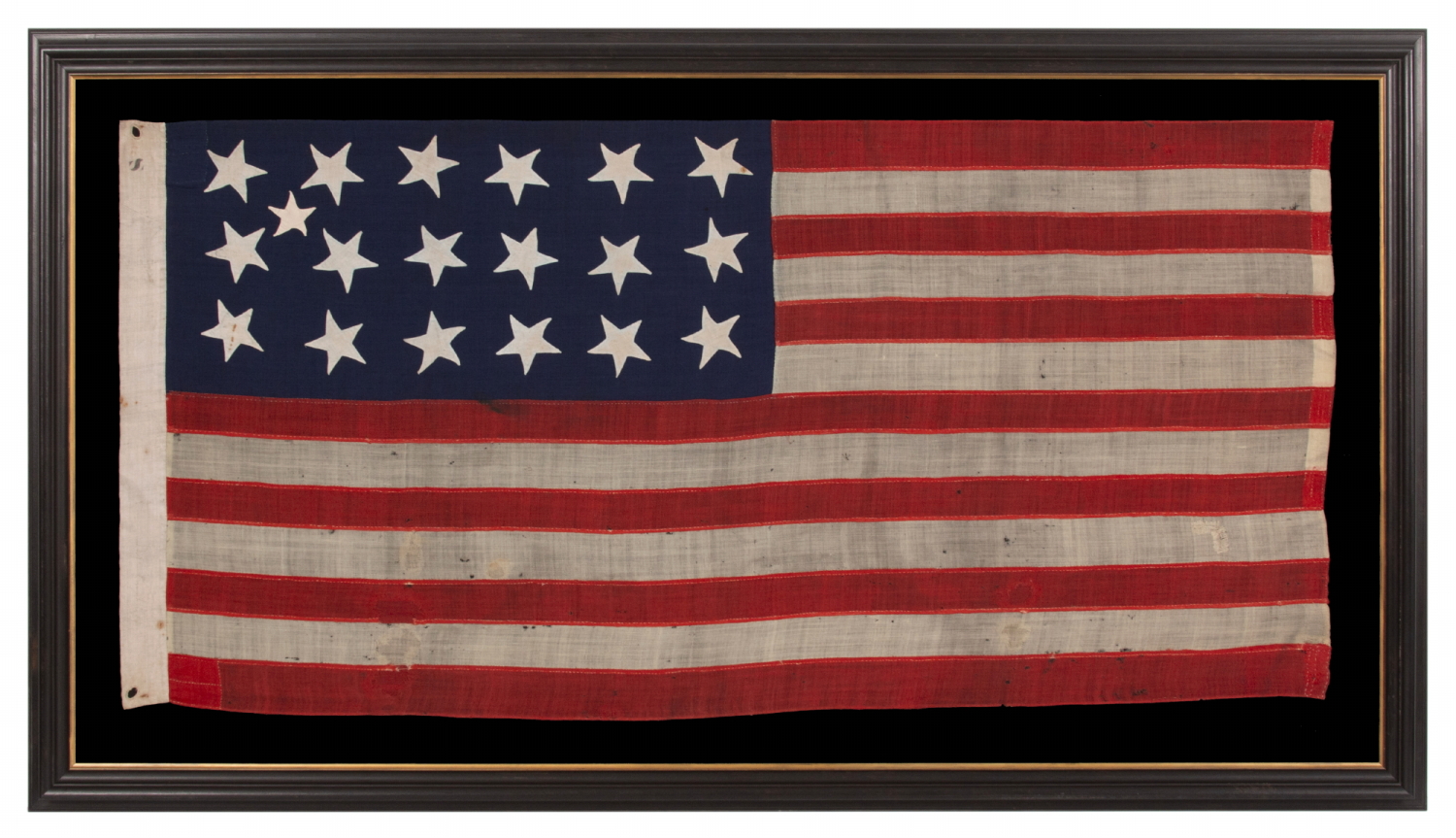 18 STAR ANTIQUE AMERICAN FLAG WITH 13 STRIPES, A “DISUNION” FLAG, MADE WITH AN ABOLITIONIST MESSAGE, circa 1859-1861, EXCLUDING THE SLAVE STATES; WITH A 19TH STAR ADDED ON THE OBVERSE; OWNED BY HARVARD-TRAINED, MASSACHUSETTS PHYSICIAN BENJAMIN CUSHING, WHO VOLUNTEERED AS A U.S. ARMY SURGEON, DEVOID OF RANK OR PAY, STATIONED AT FORT MONROE, VIRGINIA, ‘CONTRABAND CAMP’ FOR ESCAPING SLAVES AND THE ONLY UNION-CONTROLLED, FORTIFIED BASE IN THE UPPER SOUTH