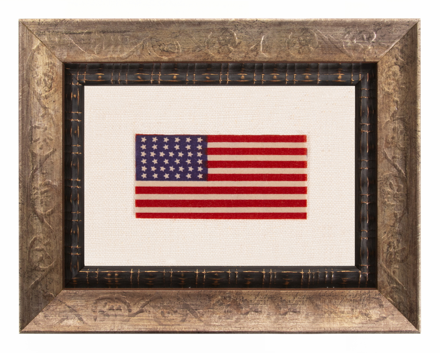 38 STAR AMERICAN FLAG RIBBON WITH JUSTIFIED ROWS OF CANTED STARS AND AN ATTRACTIVE, ELONGATED PROFILE, COLORADO STATEHOOD, 1876-1889