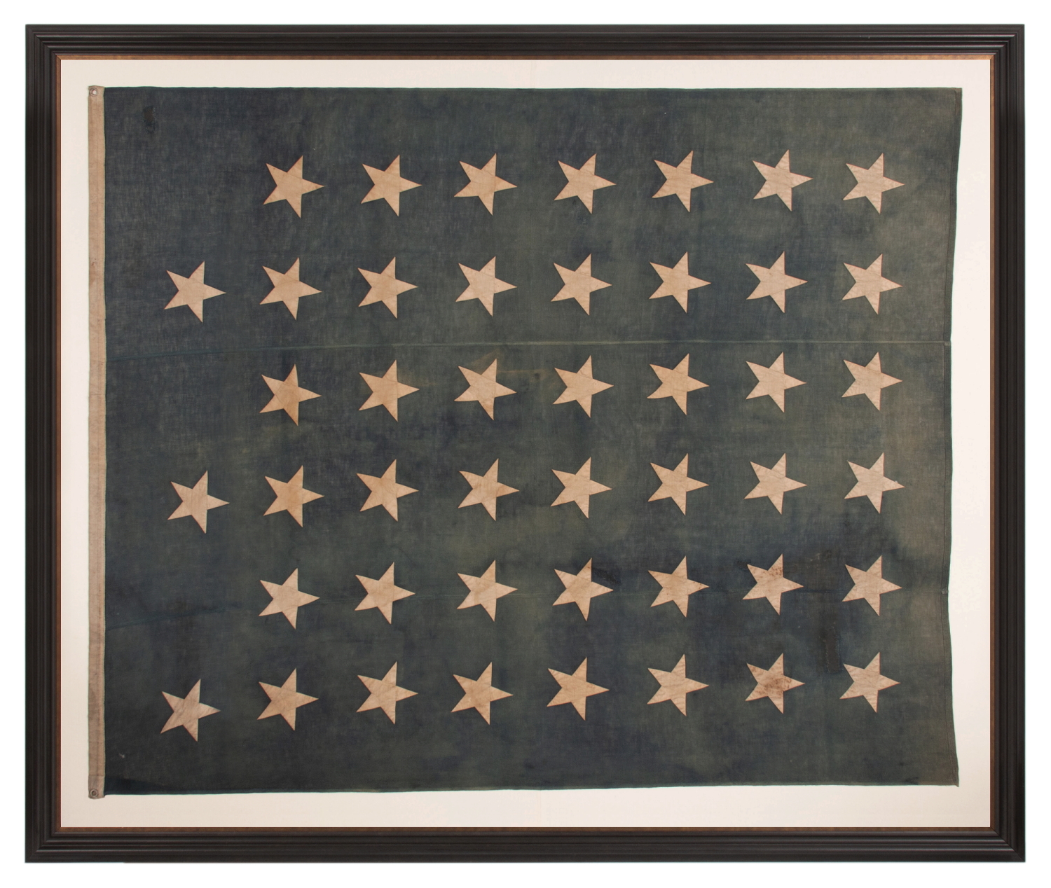 LARGE & BEAUTIFULLY FADED, ANTIQUE AMERICAN JACK w/ 45 STARS ARRANGED IN A “NOTCHED” PATTERN, INTENTIONALLY LEAVING SPACE FOR THE 3 REMAINING WESTERN TERRITORIES YET TO BE ADDED; MADE IN THE PERIOD BETWEEN 1896 - 1908, WHEN UTAH WAS THE MOST RECENT STATE TO JOIN THE UNION; SPANISH-AMERICAN WAR ERA