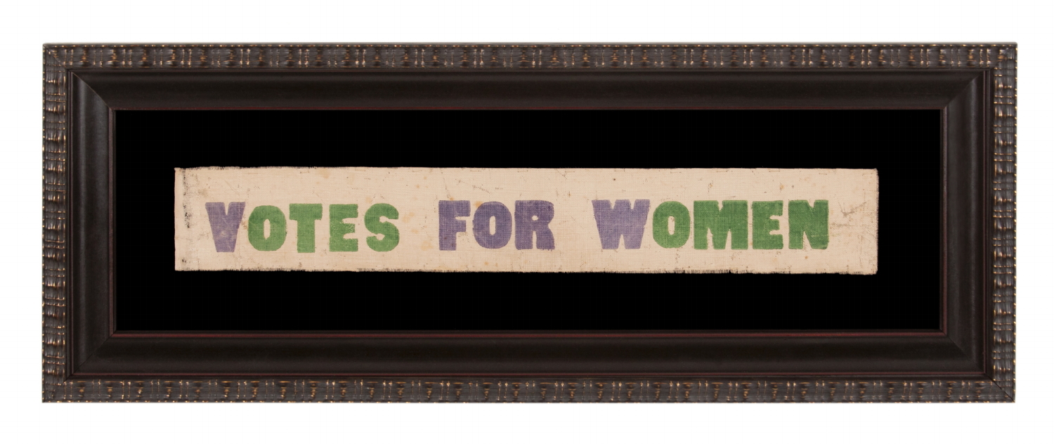 VOTES FOR WOMEN PARADE TEXTILE IN PURPLE AND GREEN, OF A TYPE WORN AS SASHES AND WAVED AS NARROW PARADE BANNERS, MADE IN HARTFORD, CONNECTICUT BY CALHOUN PRESS FOR THE WOMEN'S POLITICAL UNION OF NEW YORK, CONNECTICUT, AND NEW JERSEY, ORGANIZED BY CARRIE STANTON'S DAUGHTER, HARRIOT EATON STANTON BLATCH, 1910-1915