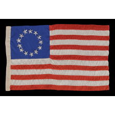 13 HAND-EMBROIDERED STARS AND EXPERTLY HAND-SEWN STRIPES ON AN ANTIQUE AMERICAN FLAG MADE IN PHILADELPHIA IN BY RACHEL ALBRIGHT OR SARAH M. WILSON, GRANDDAUGHTER AND GREAT GRANDDAUGHTER OF BETSY ROSS, 1898-1913