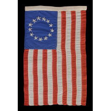 13 HAND-EMBROIDERED STARS AND EXPERTLY HAND-SEWN STRIPES ON AN ANTIQUE AMERICAN FLAG MADE IN PHILADELPHIA IN BY RACHEL ALBRIGHT OR SARAH M. WILSON, GRANDDAUGHTER AND GREAT GRANDDAUGHTER OF BETSY ROSS, 1898-1913