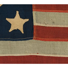 13 HAND-SEWN, SINGLE-APPLIQUED  STARS, MADE BY ANNIN & CO. IN NEW YORK CITY, A RARE, TINY SIZE AMONG KNOWN FLAGS WITH SEWN CONSTRUCTION, 1863 -1876