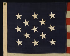 13 HAND-SEWN STARS, 1876 CENTENNIAL ERA, IN A RARE, SMALL, AND HIGHLY DESIRABLE SIZE FOR THE PERIOD