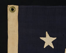 13 HAND-SEWN STARS, 1876 CENTENNIAL ERA, IN A RARE, SMALL, AND HIGHLY DESIRABLE SIZE FOR THE PERIOD