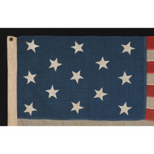 13 HAND-SEWN STARS ON A U.S. NAVY SMALL BOAT ENSIGN OF THE 1876 CENTENNIAL ERA