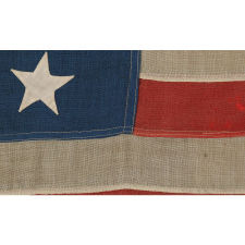 13 HAND-SEWN STARS ON A U.S. NAVY SMALL BOAT ENSIGN OF THE 1876 CENTENNIAL ERA