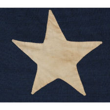 13 HUGE STARS, HAPHAZARDLY CONFIGURED IN A 4-5-4 PATTERN, ON A STRIKINGLY GRAPHIC FLAG OF THE CIVIL WAR ERA, MARKED “BIG BAY” AND PROBABLY EMPLOYED IN U.S. ARMY OR NAVY SERVICE