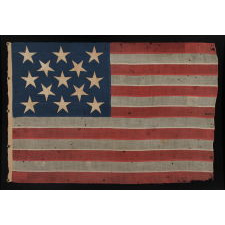 13 LARGE AND STRIKINGLY VISUAL STARS ON A U.S. NAVY SMALL BOAT ENSIGN, ENTIRELY HAND-SEWN, CA 1884-87