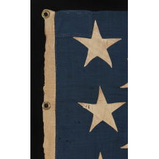 13 LARGE AND STRIKINGLY VISUAL STARS ON A U.S. NAVY SMALL BOAT ENSIGN, ENTIRELY HAND-SEWN, CA 1884-87