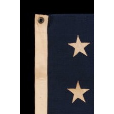 13 STAR ANTIQUE AMERICAN FLAG WITH A 3-2-3-2-3 CONFIGURATION OF STARS; A SMALL-SCALE EXAMPLE, MADE CIRCA 1895-1926