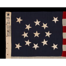 13 STAR ANTIQUE AMERICAN FLAG WITH A MEDALLION CONFIGURATION OF STARS; A SMALL-SCALE EXAMPLE, MADE circa 1895-1926