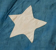 13 STAR FLAG IN THE 3rd MARYLAND PATTERN, AN EXTRAORDINARY EXAMPLE WITH THE STRIPES STARTING AND ENDING ON WHITE AND A CORNFLOWER BLUE CANTON RESTING ON THE WAR STRIPE, PRE-CIVIL WAR, CA 1830-60