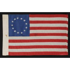 13 STAR FLAG WITH EXPERTLY HAND-SEWN STRIPES AND EMBROIDERED STARS, MADE BY RACHEL ALBRIGHT, GRANDDAUGHTER OF BETSY ROSS, IN PHILADELPHIA IN 1903