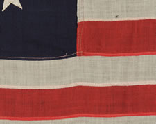 13 STAR PRIVATE YACHT ENSIGN, A NICE GRAPHIC EXAMPLE WITH AN ATTRACTIVE, CANTED ANCHOR, DATED 1908