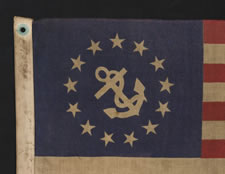 13 STAR PRIVATE YACHT ENSIGN WITH AN ANCHOR IN A WREATH OF STARS, 1945-1960