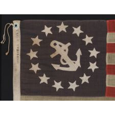 13 STAR PRIVATE YACHT FLAG, A SCARCE AND DESIRABLE EXAMPLE WITH SINGLE-APPLIQUÉD, HAND-SEWN STARS AND ANCHOR, MADE BY ANNIN IN NEW YORK CITY, CA 1875-1890's