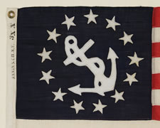 13 STAR PRIVATE YACHT FLAG, A SCARCE AND DESIRABLE EXAMPLE WITH SINGLE-APPLIQUED, HAND-SEWN STARS AND ANCHOR, PROBABLY MADE BY ANNIN IN NEW YORK CITY, CA 1890-1910