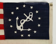 13 STAR PRIVATE YACHT FLAG, A SCARCE AND DESIRABLE EXAMPLE WITH SINGLE-APPLIQUED, HAND-SEWN STARS AND ANCHOR, PROBABLY MADE BY ANNIN IN NEW YORK CITY, CA 1890-1910