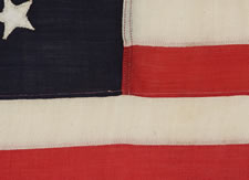 13 STAR PRIVATE YACHT FLAG, A SCARCE AND DESIRABLE EXAMPLE WITH SINGLE-APPLIQUED, HAND-SEWN STARS AND ANCHOR, PROBABLY MADE BY ANNIN IN NEW YORK CITY, CA 1890-1910