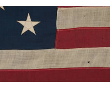 13 STARS IN A 3-2-3-2-3 CONFIGURATION, SMALL SCALE FLAG WITH ELONGATED PROPORTIONS, 1895-1910