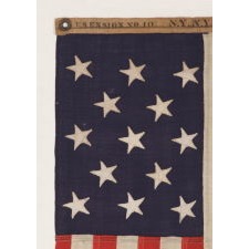 13 STARS IN A 3-2-3-2-3 PATTERN ON A UNITED STATES NAVY SMALL BOAT ENSIGN OF EXCEPTIONALLY SMALL SCALE, MADE AT THE BROOKLYN NAVY YARD, NEW YORK, SIGNED & DATED 1906