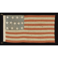 13 STARS IN A 4-5-4 PATTERN, ON A FLAG OF THE CIVIL WAR ERA, WITH BEAUTIFUL COLORATION AND IN A TINY SCALE AMONGST ITS PIECED-AND-SEWN COUNTERPARTS