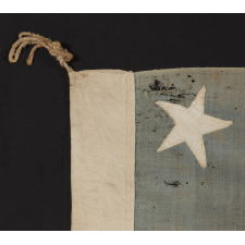 13 STARS IN A 4-5-4 PATTERN, ON A FLAG OF THE CIVIL WAR ERA, WITH BEAUTIFUL COLORATION AND IN A TINY SCALE AMONGST ITS PIECED-AND-SEWN COUNTERPARTS