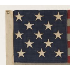 13 STARS ARRANGED IN A 3-2-3-2-3 LINEAL CONFIGURATION ON A SMALL-SCALE ANTIQUE AMERICAN FLAG MADE DURING THE FIRST HALF OF THE 1890's