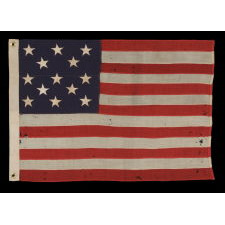 13 STARS ARRANGED IN A 3-2-3-2-3 LINEAL CONFIGURATION ON A SMALL-SCALE ANTIQUE AMERICAN FLAG MADE DURING THE FIRST HALF OF THE 1890's