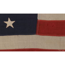 13 STARS ARRANGED IN A 3-2-3-2-3 PATTERN, ON A SMALL-SCALE ANTIQUE AMERICAN FLAG OF THE 1895-1926 ERA