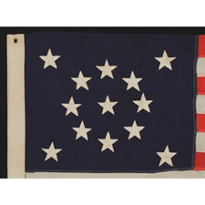 13 STARS ARRANGED IN A MEDALLION PATTERN ON  A SMALL-SCALE FLAG OF THE 1890's