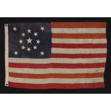 13 STARS ARRANGED IN A MEDALLION PATTERN WITH A LARGE CENTER STAR, ON A SMALL-SCALE FLAG OF THE 1895-1920's ERA