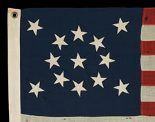 13 STARS IN A MEDALLION CONFIGURATION ON A SMALL-SCALE FLAG OF THE 1890-1920'S ERA