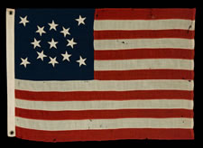 13 STARS IN A MEDALLION CONFIGURATION ON A SMALL-SCALE FLAG OF THE 1890-1920'S ERA