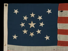 13 STARS IN A MEDALLION CONFIGURATION ON A SMALL-SCALE FLAG OF THE 1890-1920'S ERA