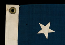 13 STARS IN A MEDALLION CONFIGURATION ON A SMALL-SCALE FLAG OF THE 1890-1920'S ERA