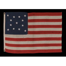 13 STARS IN A MEDALLION CONFIGURATION ON A SMALL-SCALE ANTIQUE AMERICAN FLAG OF THE 1890-1900 ERA