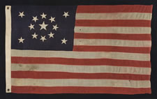 13 STARS IN A MEDALLION CONFIGURATION ON A SMALL-SCALE FLAG OF THE 1895-1920'S ERA