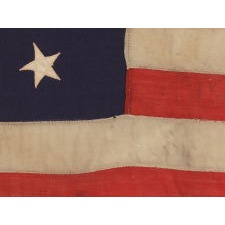 13 STARS IN A MEDALLION CONFIGURATION ON A SMALL-SCALE ANTIQUE AMERICAN FLAG OF THE 1895-1926 ERA