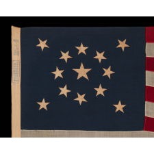 13 STARS IN A MEDALLION CONFIGURATION ON A SMALL-SCALE ANTIQUE AMERICAN FLAG OF THE 1895-1926 ERA, MARKED "STANDARD"