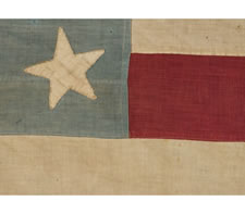 13 STARS IN A MEDALLION PATTERN ON A BEAUTIFUL, FADED, CORNFLOWER BLUE CANTON, CIVIL WAR PERIOD (1861-65) OR CENTENNIAL (1876), A WONDERFUL AND DYNAMIC EXAMPLE