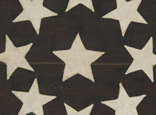 13 STARS IN A MEDALLION PATTERN ON A SMALL-SCALE FLAG OF THE 1890-1910 ERA