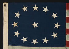 13 STARS IN AN OVAL FORM OF THE 3RD MARYLAND PATTERN, ON AN ATTRACTIVE, SMALL-SCALE FLAG MADE IN THE 1890-1920's ERA