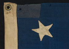 13 STARS WITH SCATTERED POSITIONING IN A 3-2-3-2-3 CONFIGURATION, MADE EITHER FOR THE 1876 CENTENNIAL CELEBRATION OR AS A PRIVATE NAUTICAL ENSIGN, CA 1876-1895