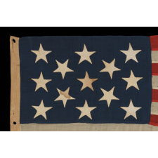 13 STARS ON A U.S. NAVY SMALL BOAT ENSIGN, ENTIRELY HAND-SEWN, PROBABLY MADE BETWEEN 1882 AND 1884, A BEAUTIFUL EXAMPLE IN A REMARKABLE STATE OF PRESERVATION