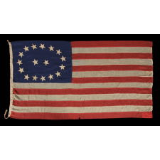 17 STARS IN AN OVAL MEDALLION WITH 2 STARS IN THE CENTER, A MID-19TH CENTURY FLAG WITH A RARE STAR COUNT, IN AN EXTRAORDINARY CONFIGURATION, AND IN A DESIRABLE SMALL SCALE AMONG ITS COUNTERPARTS OF THE PERIOD; MADE CA 1850-1865, LIKELY TO COMMEMORATE OHIO AS THE 17TH STATE