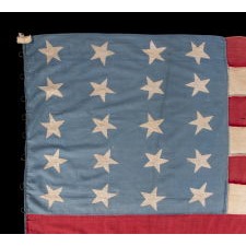 20 STARS AND 11 STRIPES ON AN ANTIQUE AMERICAN FLAG OF THE CIVIL WAR PERIOD, HOMEMADE AND ENTIRELY-HAND-SEWN, WITH ITS LIGHT BLUE CANTON RESTING ON THE WAR STRIPE; PROBABLY MADE TO COMMEMORATE THE DECEMBER 10TH, 1817 ADDITION OF MISSISSIPPI AS THE 20TH STATE, AND THE COUNT OF 11 STATES THAT SECEDED FROM THE UNION BETWEEN DECEMBER OF 1860 AND JUNE OF 1861