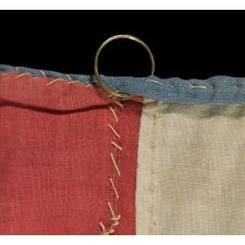 20 STARS AND 11 STRIPES ON AN ANTIQUE AMERICAN FLAG OF THE CIVIL WAR PERIOD, HOMEMADE AND ENTIRELY-HAND-SEWN, WITH ITS LIGHT BLUE CANTON RESTING ON THE WAR STRIPE; PROBABLY MADE TO COMMEMORATE THE DECEMBER 10TH, 1817 ADDITION OF MISSISSIPPI AS THE 20TH STATE, AND THE COUNT OF 11 STATES THAT SECEDED FROM THE UNION BETWEEN DECEMBER OF 1860 AND JUNE OF 1861