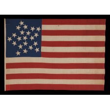 21 HAND-SEWN STARS IN A “GREAT STAR” OR “GREAT LUMINARY” PATTERN, ON AN EXTRAORDINARY SOUTHERN-EXCLUSIONARY FLAG MADE DURING THE CIVIL WAR